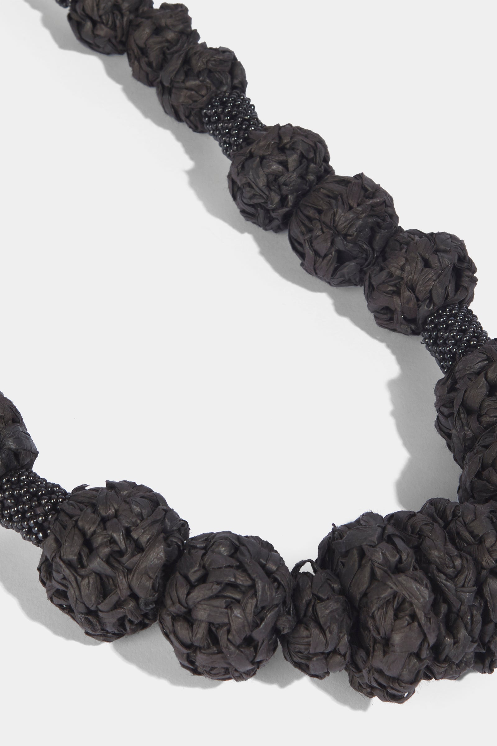 Long necklace crochet raffia elements | liviana conti