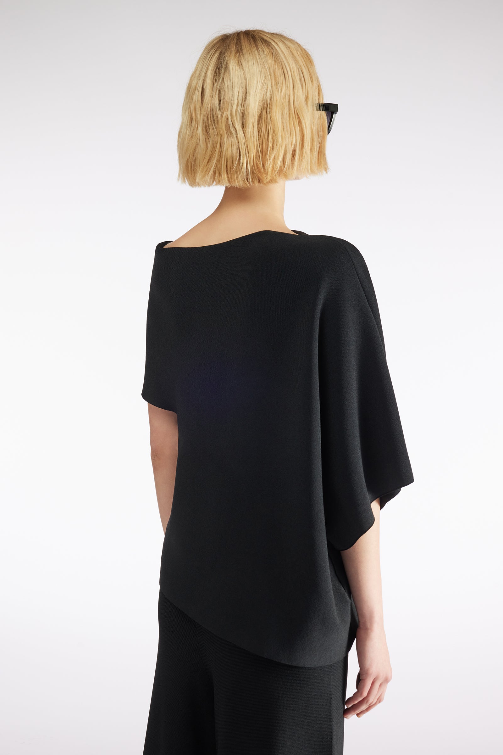 ASYMMETRICAL TOP