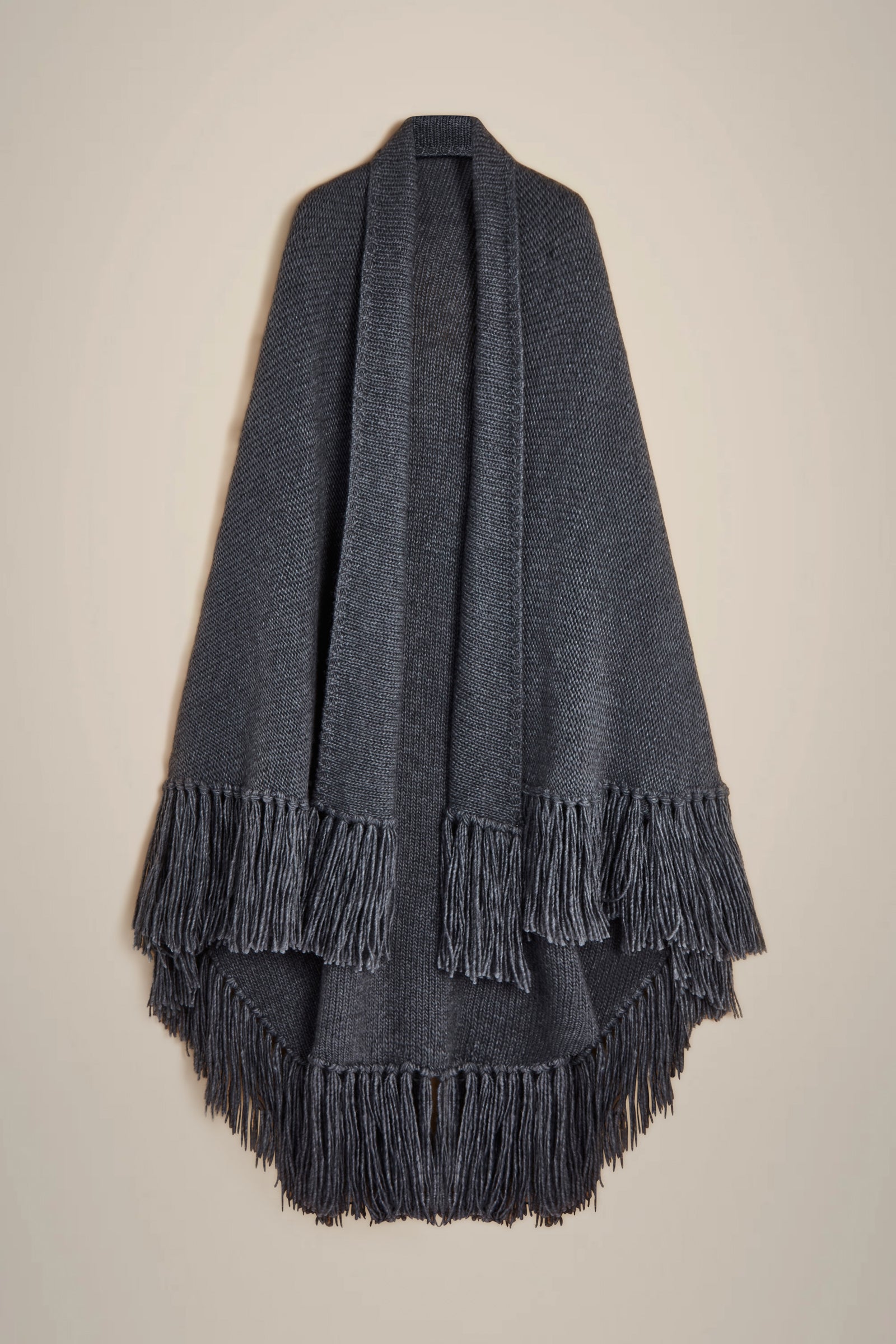 FRINGED CAPE