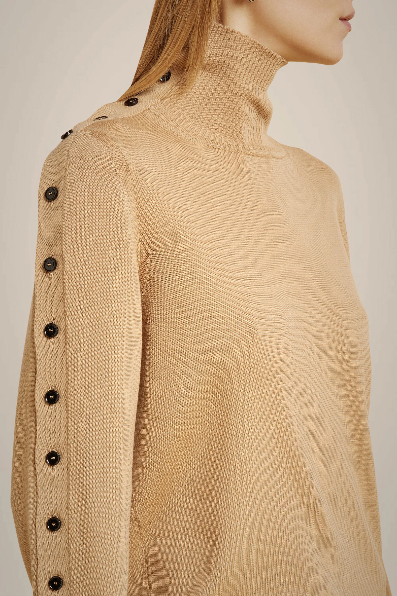 MERINO WOOL SWEATER WITH BUTTONED SLEEVES