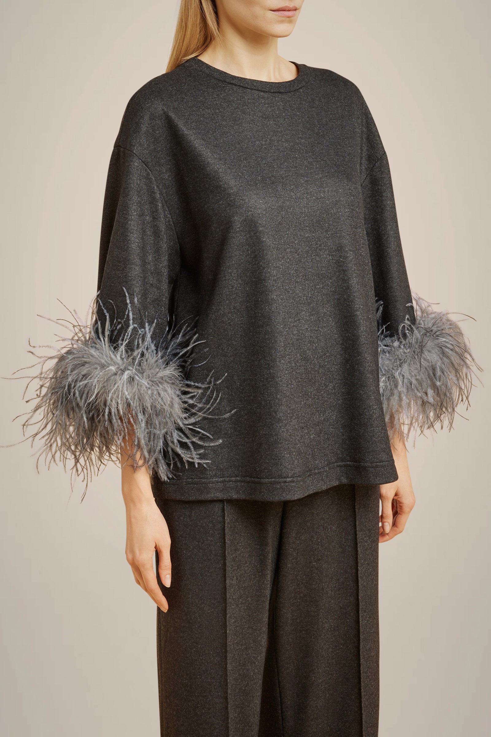 BLOUSE WITH FEATHERS