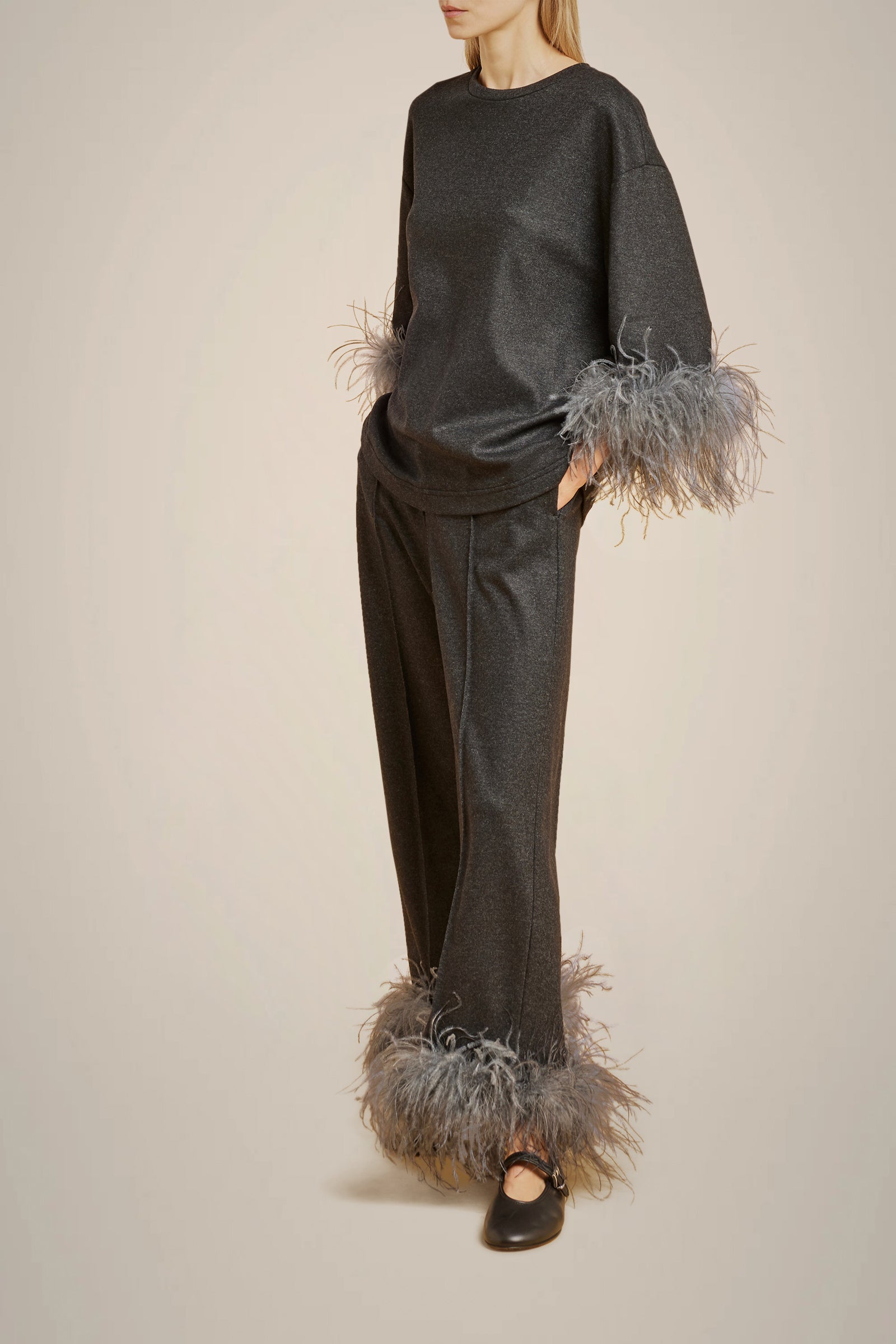 TROUSERS WITH FEATHERS