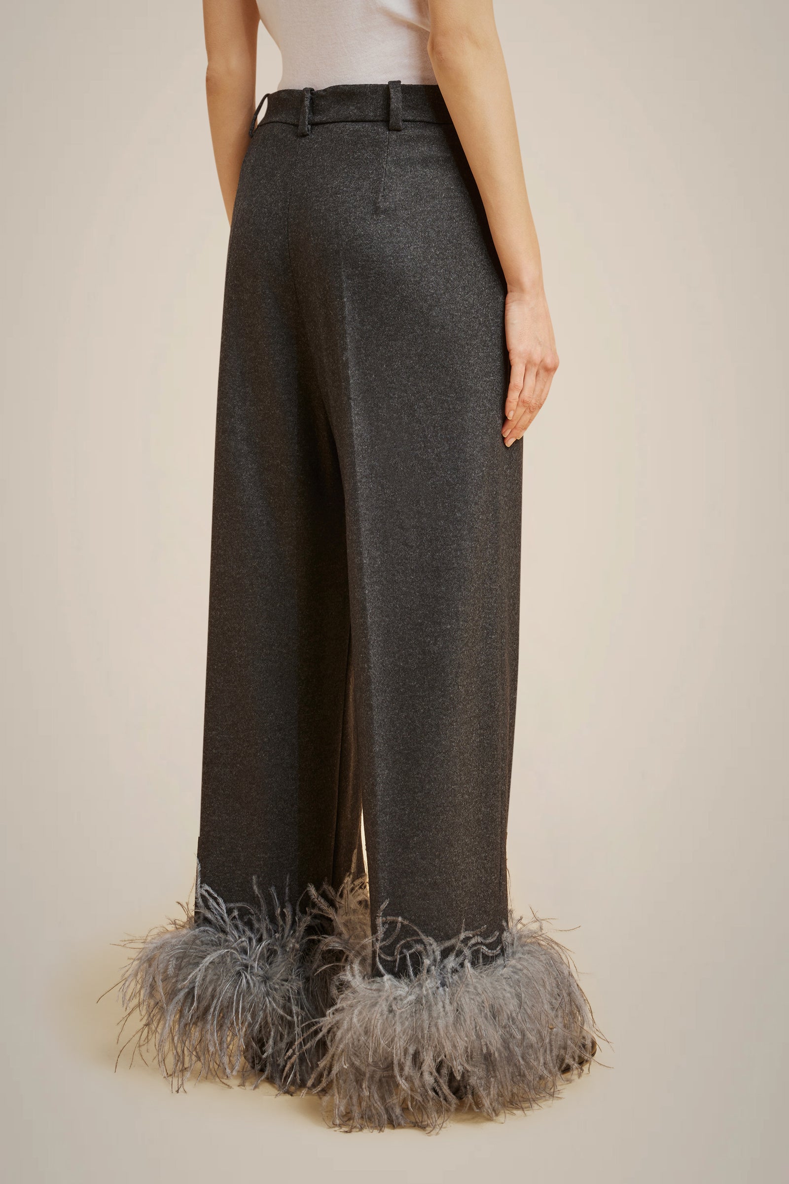 TROUSERS WITH FEATHERS